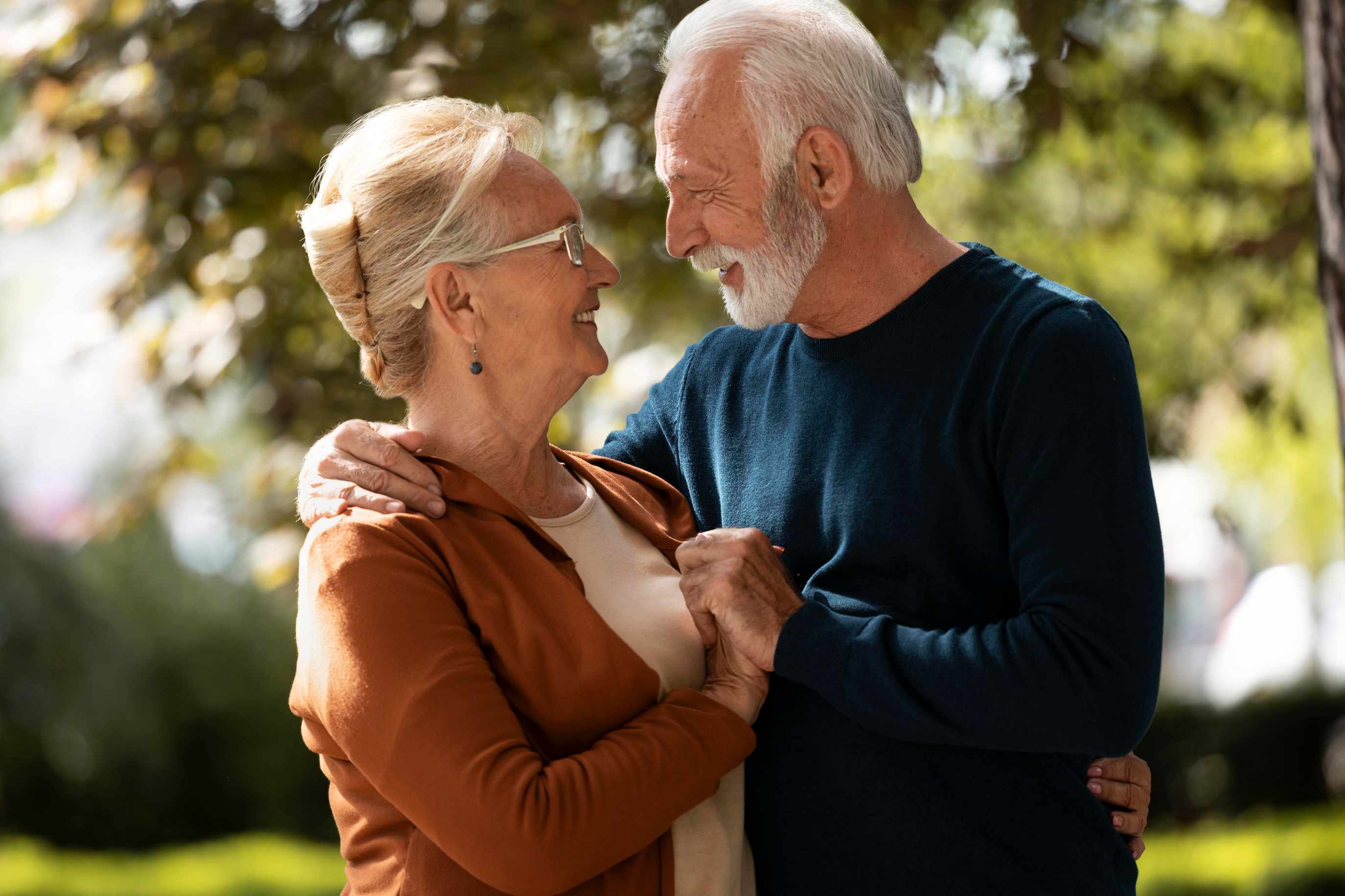 senior couple holding each other